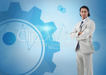 Businessman standing against a digital background