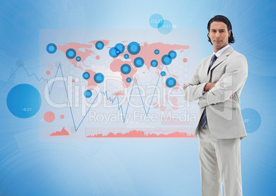 Businessman standing with a digital world map