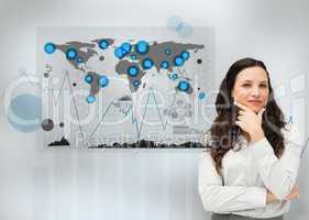 Businesswoman standing with a digital world map