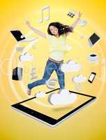 Cute woman jumping on a tablet pc