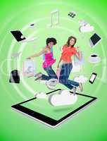 Two happy women jumping on a tablet pc