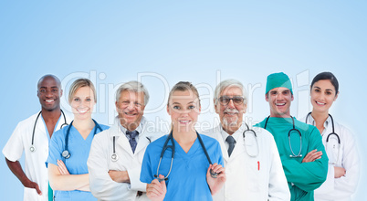 Medical team standing in line on blue background