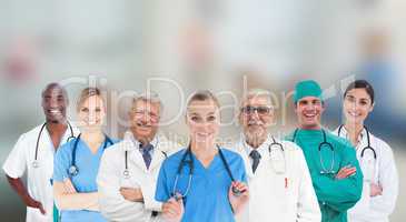 Smiling medical team standing in line