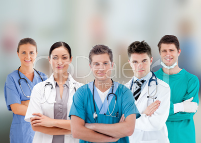 Smiling hospital workers standing in line