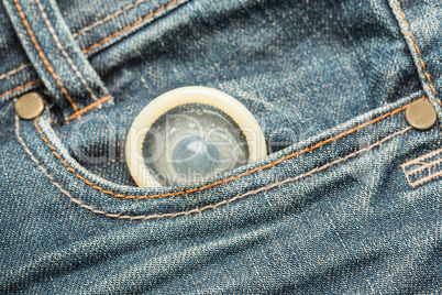 Condom peeking out from pocket