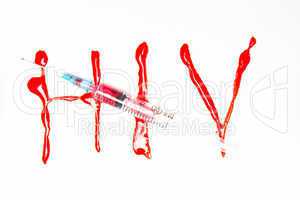 HIV spelled out in blood and syringe