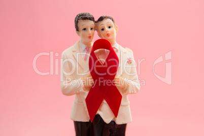 Gay groom cake toppers with red awareness ribbon