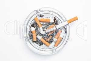 Overhead of burning cigarette in ashtray