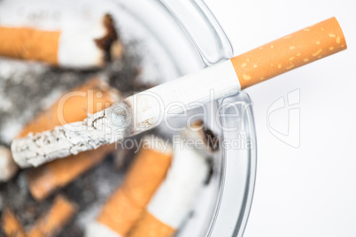 Close up of cigarette in ashtray