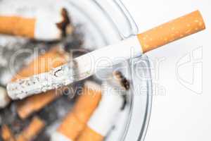 Close up of cigarette in ashtray