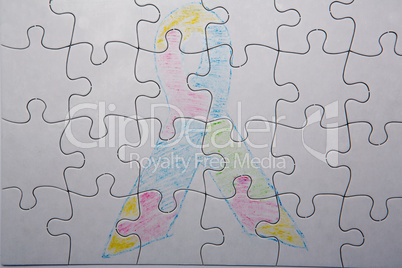 Crayon drawing of autism and aspergers ribbon