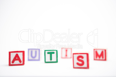 Autism spelled out in letter blocks