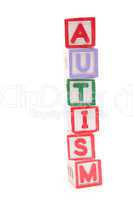 Autism spelled out in stacked letter blocks