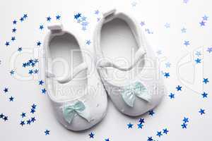 Baby blue booties with confetti