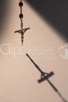 Crucifix casting a shadow