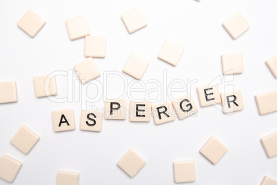 Asperger spelled out in letter pieces