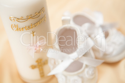 Baptism candle and baby booties