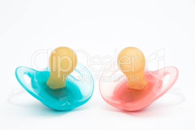 Blue and pink soothers