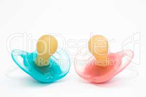 Blue and pink soothers
