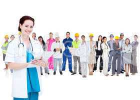 Pretty doctor standing in front of diverse career group