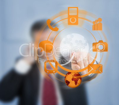 Businessman using orange wheel interface for computer applicatio