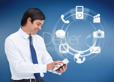 Businessman using tablet with applications