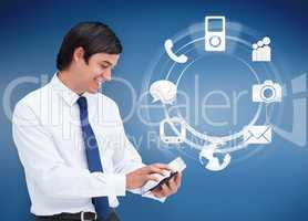 Businessman using tablet with applications