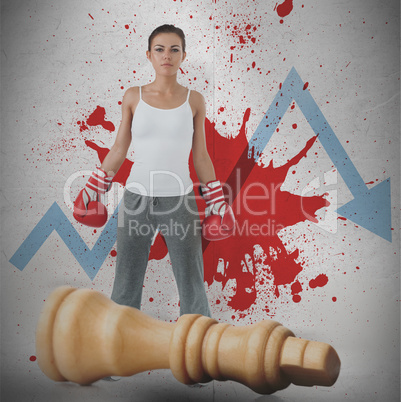 Female boxer against loss arrow and blood spatter with fallen ch