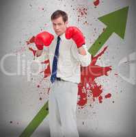 Businessman in boxing gloves against profit arrow and blood spat