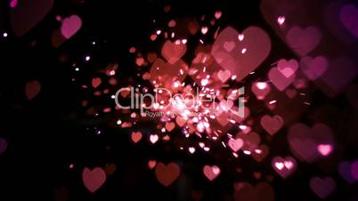 Pink heart confetti and sparks