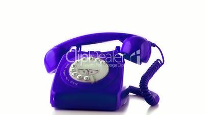 Receiver falling on purple dial phone