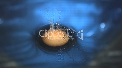 Egg falling in water