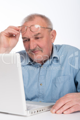 Mature man with laptop