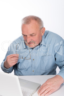 Mature man with laptop