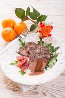 crunchy duck's breast with orange and rucola