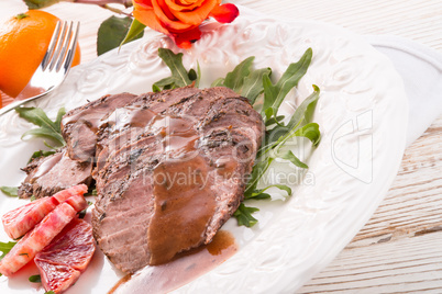 crunchy duck's breast with orange and rucola