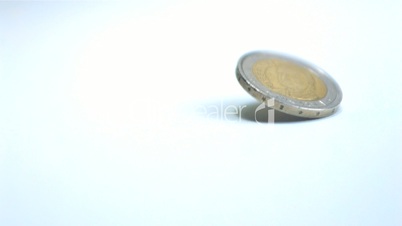 Two euro coin spinning