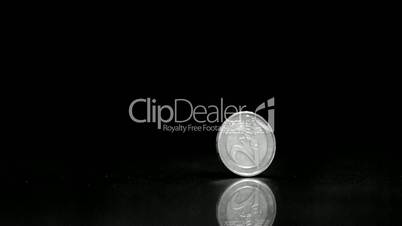 Silver two euro coin spinning