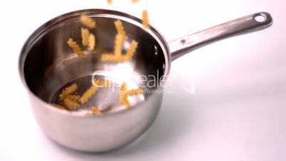 Fusilli falling in pot