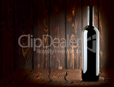 Bottle on a wooden background