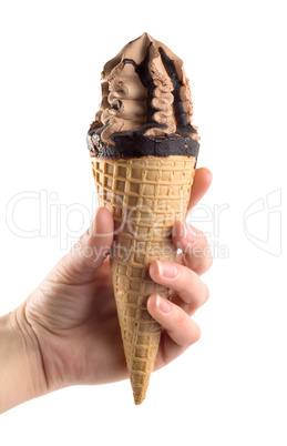 An ice cream in a hand is isolated