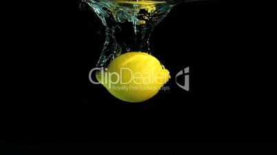 Lemon dropping in water