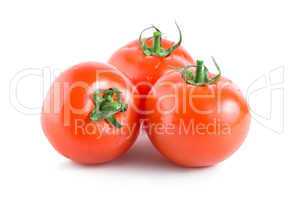 Three red tomatoes isolated