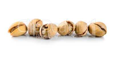 Pistachios isolated on white