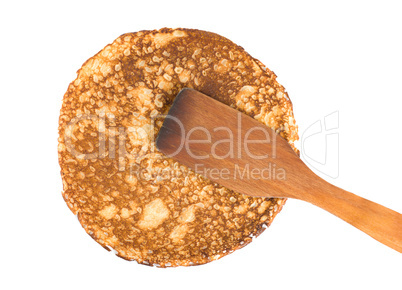 Pancake with a spatula