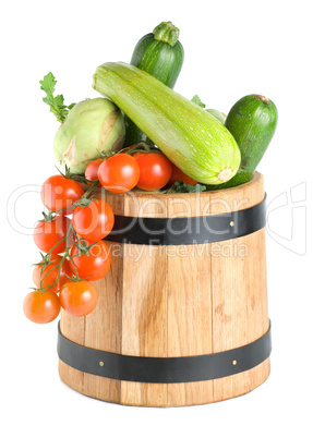 Wooden barrel with vegetables isolated