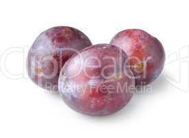 Three plums isolated