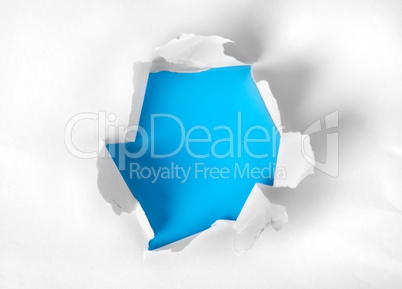 Paper torn with blue background