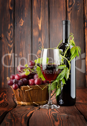 Bottle of wine and grapes