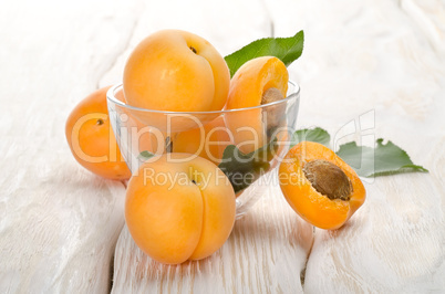 Apricots on a wooden background